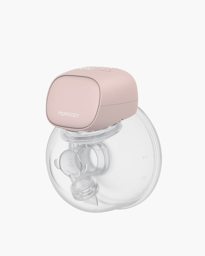 S9 Pro Wearable Breast Pump in soft pink with clear milk collector and compact design.