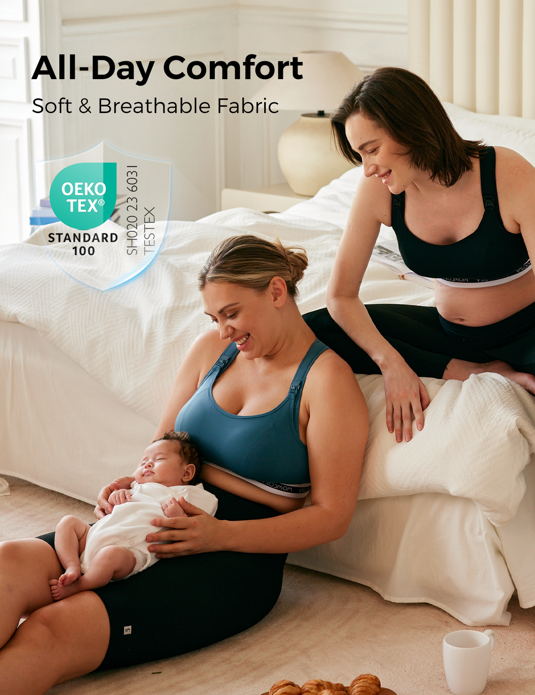 Two women in Low Impact Nursing Sports Bra , one holding a baby, promoting all-day comfort.