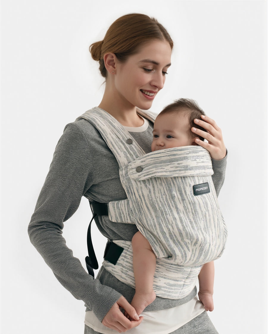 Momcozy HeriHug Baby Carrier made from 100% linen, offering comfort and ergonomic support for mom and baby.