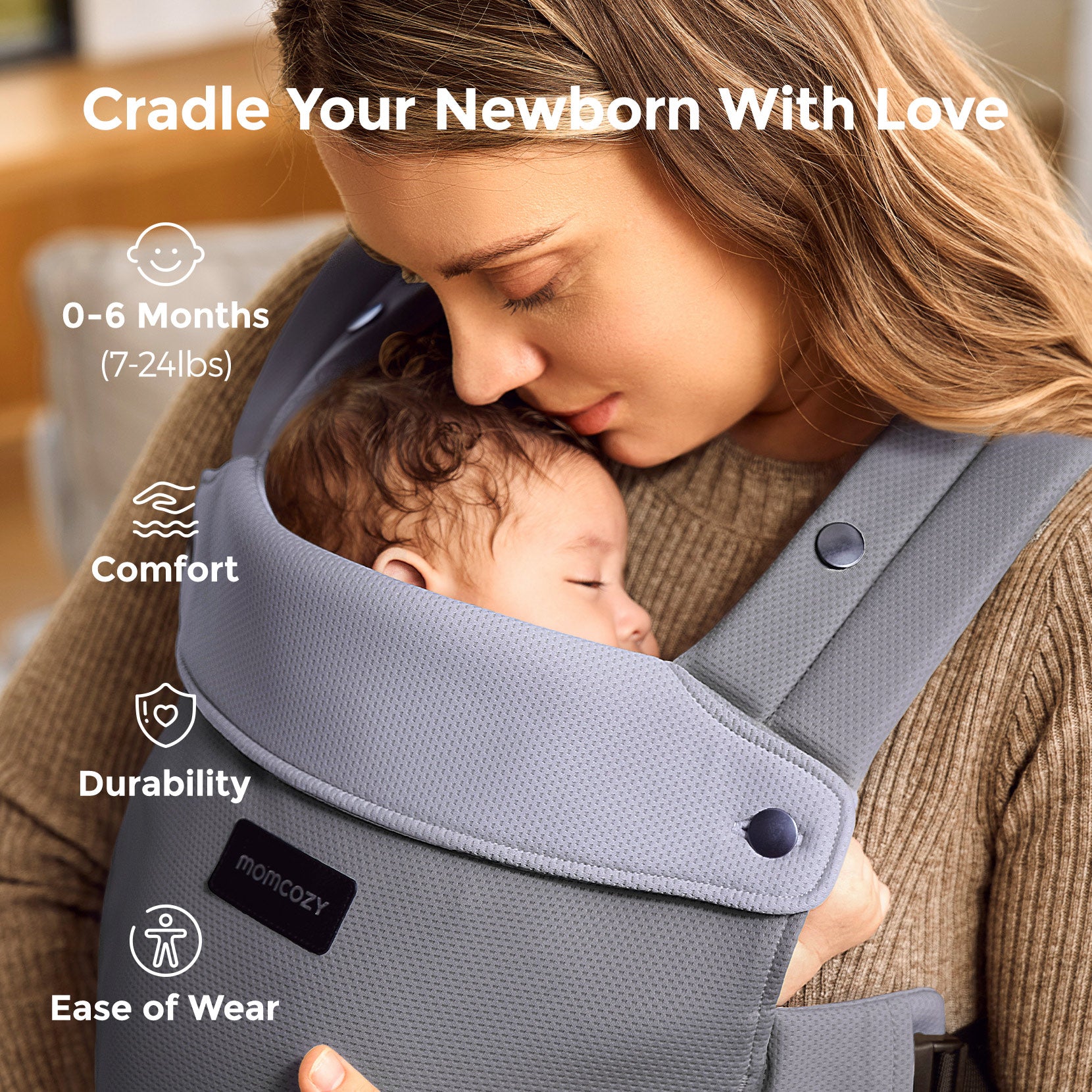 Momcozy baby carrier cradling newborn, light gray, offering comfort and durability for newborns, designed for 0-6 months.