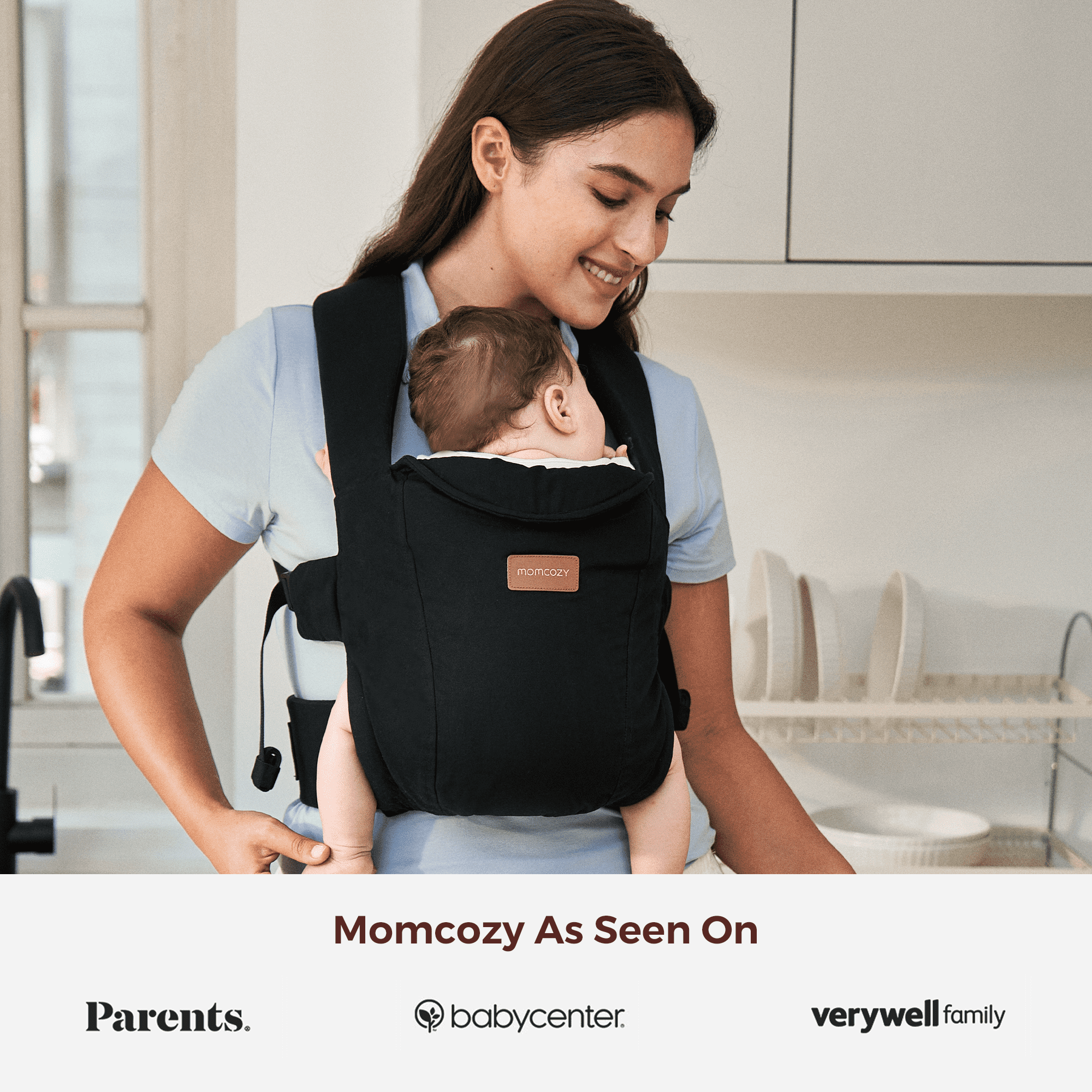 Momcozy WeeSnug newborn carrier in use, showcasing comfort and support, featured on Parents, babycenter, and verywell family.