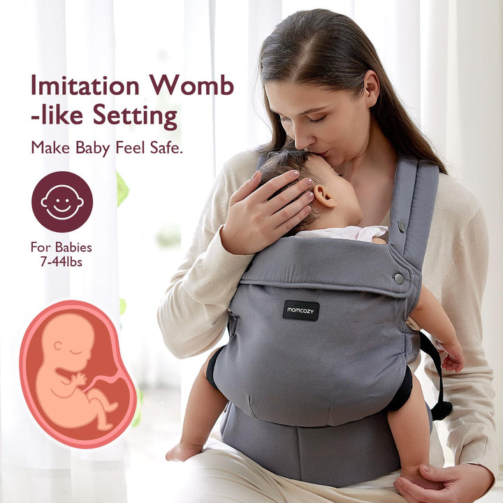 Momcozy gray baby carrier providing womb-like comfort for infants 7-41 lbs.