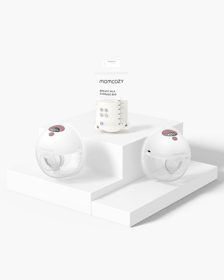 Momcozy M5 Wearable Breast Pump and milk storage bag on a pedestal, showcasing sleek design.