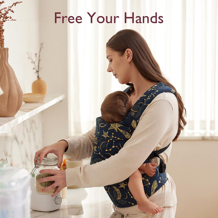 Woman using navy Momcozy baby carrier, promoting hands-free convenience for parents.