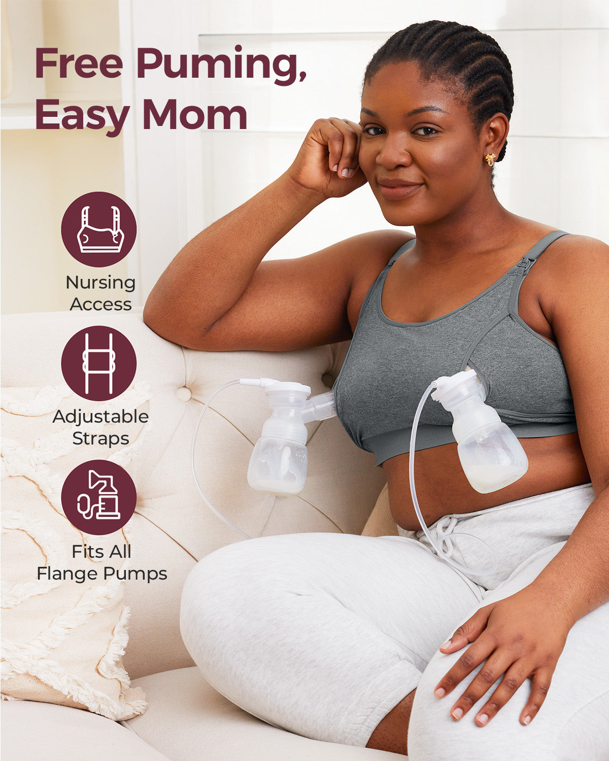 Smiling Black mom in grey YN08 pumping bra hands-free. Features nursing access, adjustable straps, fits all pumps.