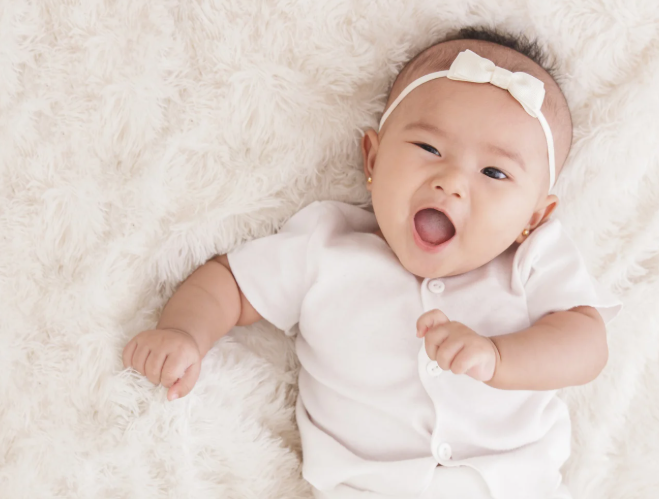 Why Do Babies Throw Their Legs Up and Down While Sleeping?