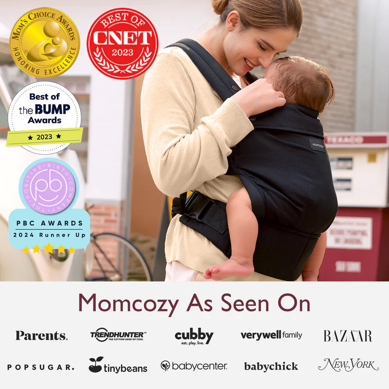 Momcozy PureHug black baby carrier, comfortable design, worn by mother. Award-winning and featured in Parents, CNET, etc.