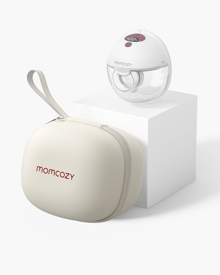 Momcozy M5 Wearable Breast Pump with cream storage case on white display pedestal.