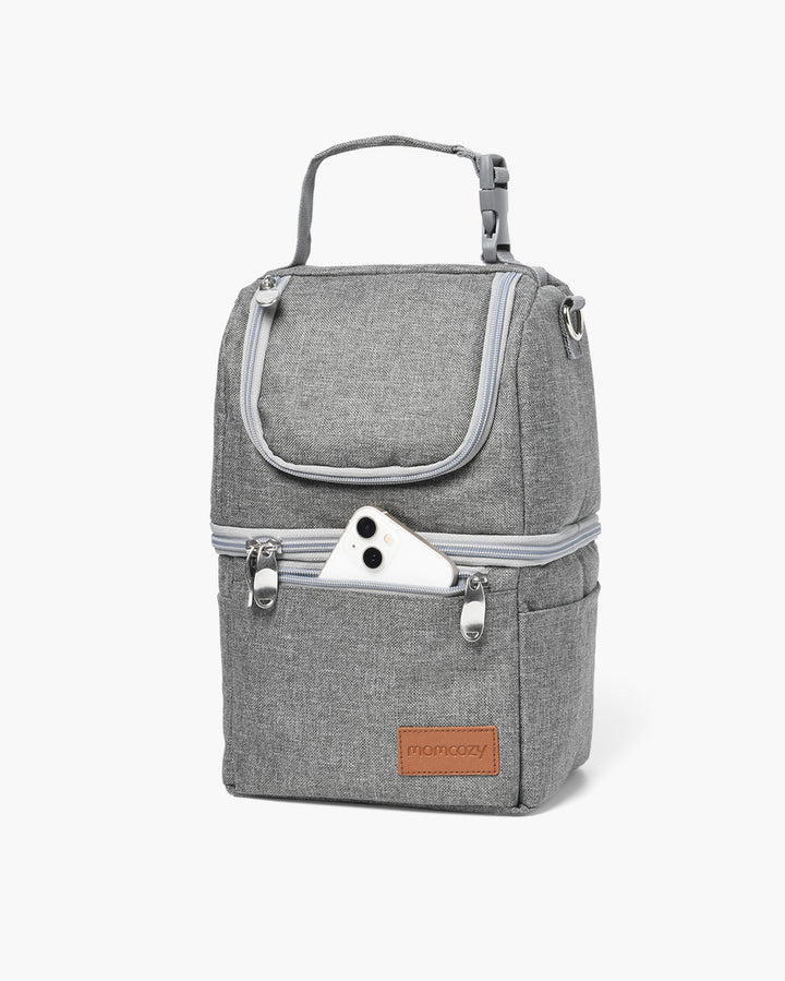 Stylish gray breastmilk cooler bag featuring two zippered compartments and a top handle.